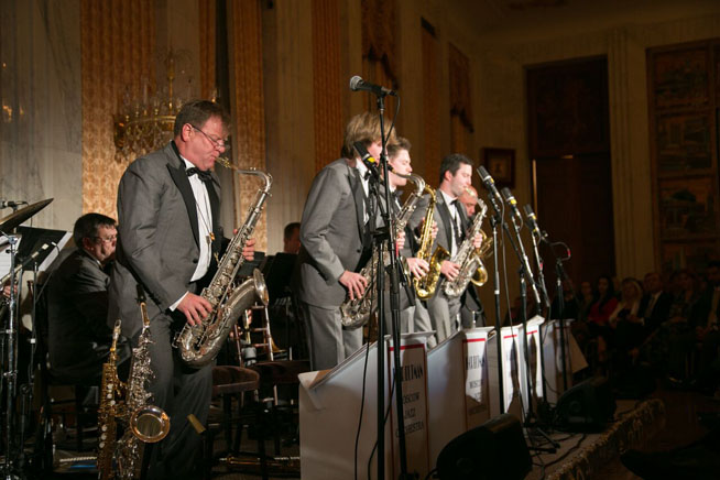 Butman plays the saxophone.